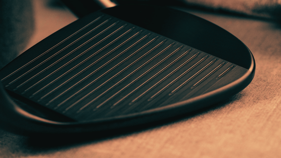 black wedge laying on table