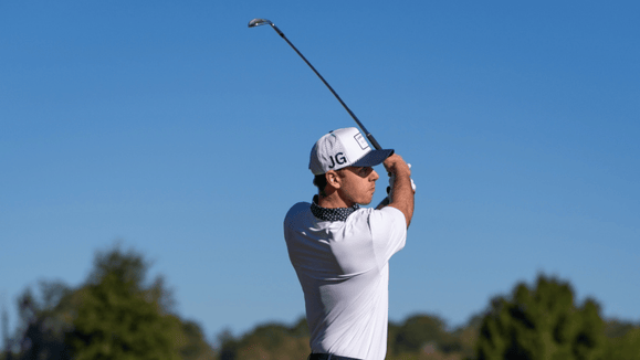 golfer posing after wedge approach shot