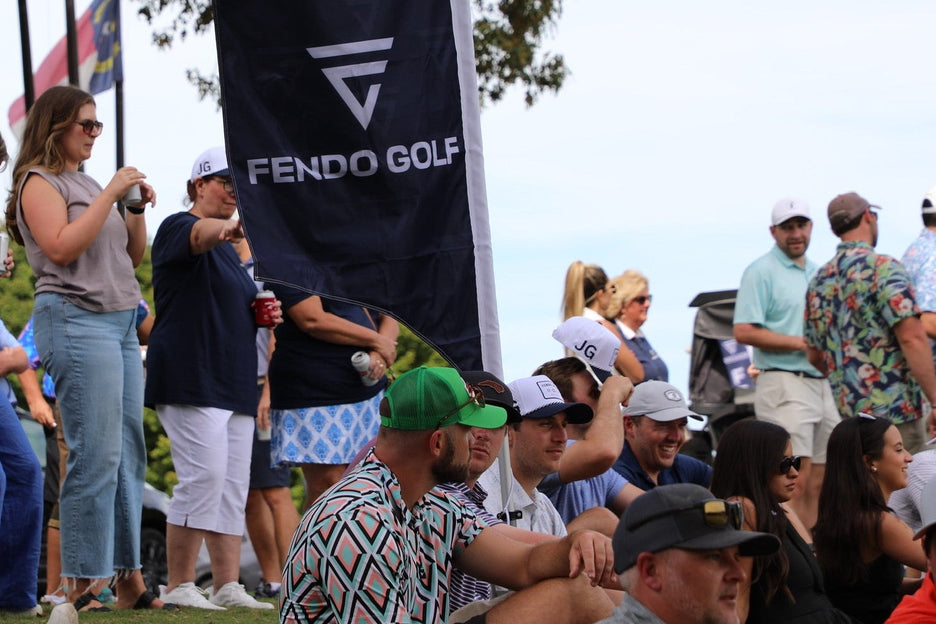 Golf event with spectators and Fendo Golf branding